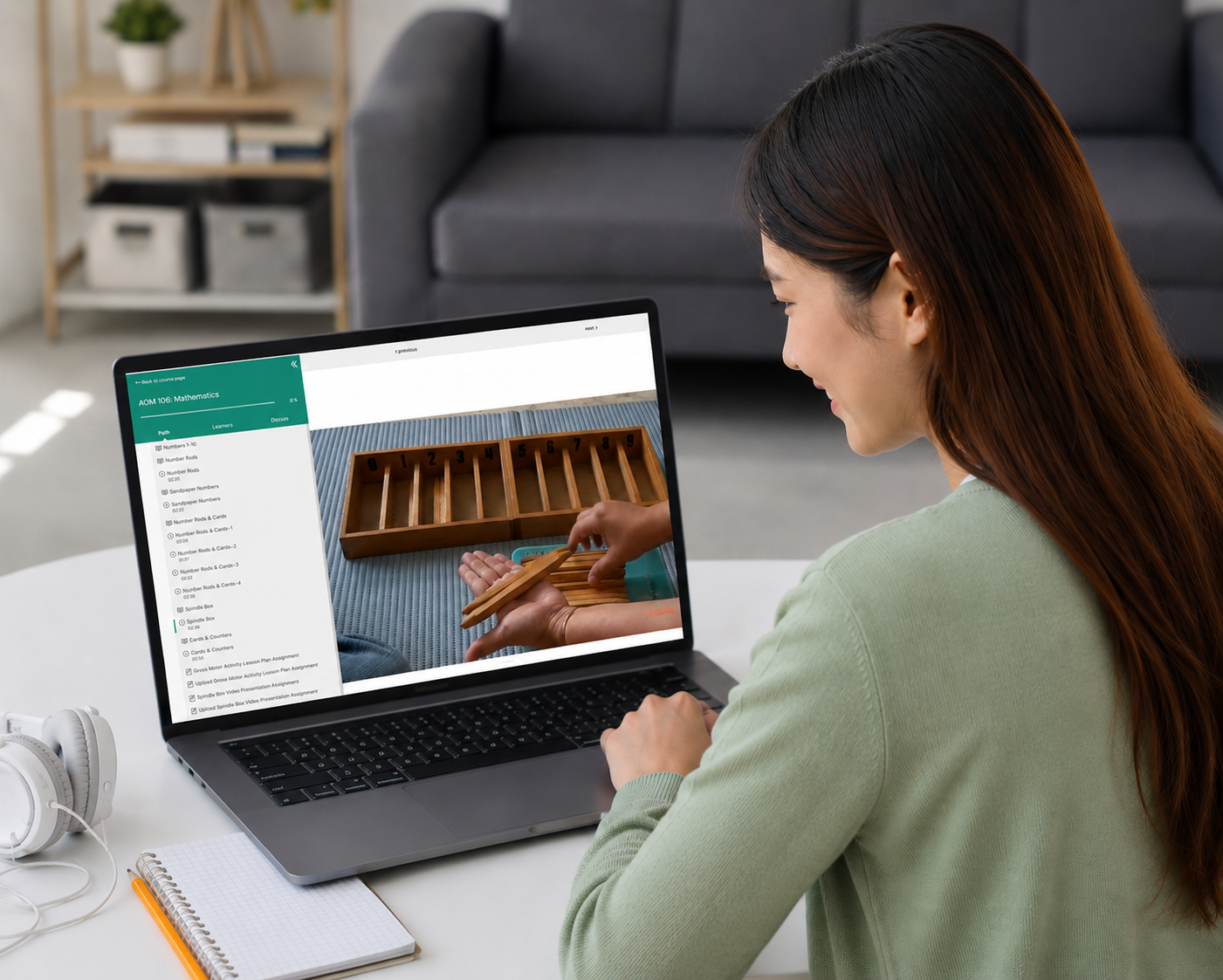 Adult learner studying AOM course online