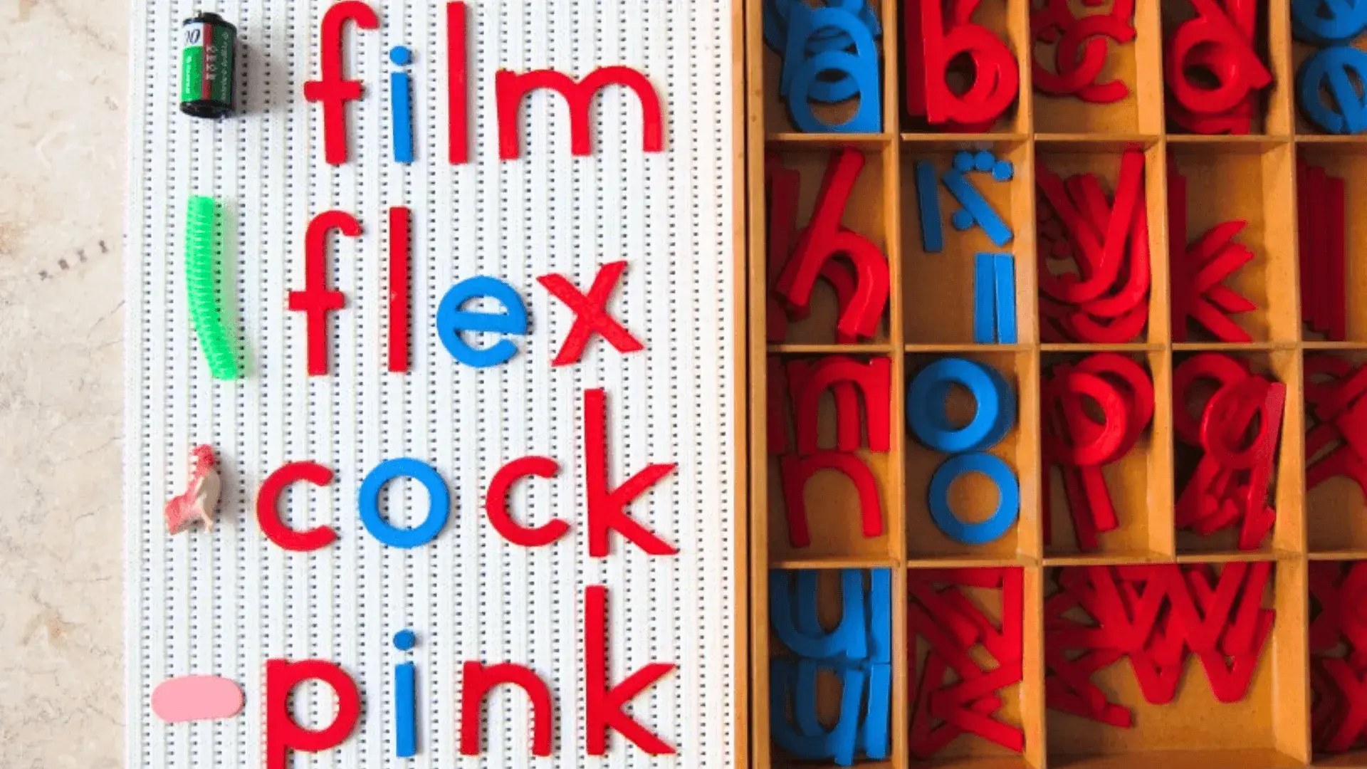Montessori moveable alphabet with a pink object used in a language activity.
