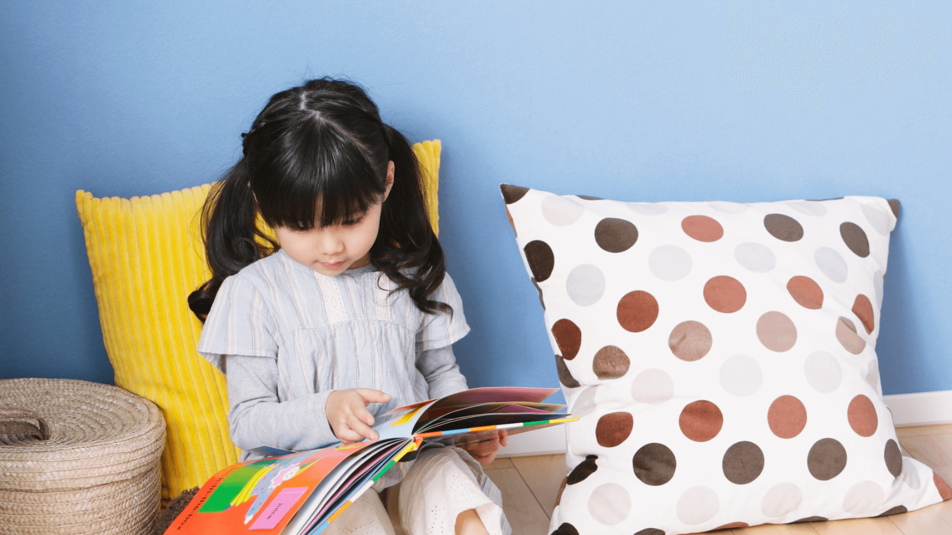A well-arranged Montessori classroom featuring low shelves with neatly organized learning materials, promoting accessibility and independence for children.